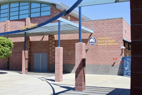 A photo of the outside of Camp Mohave Elementary School that notes "America's Best Schools Award Winner